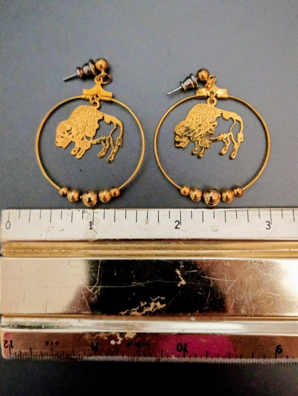 Gold Toned Bison Hoop Earrings
